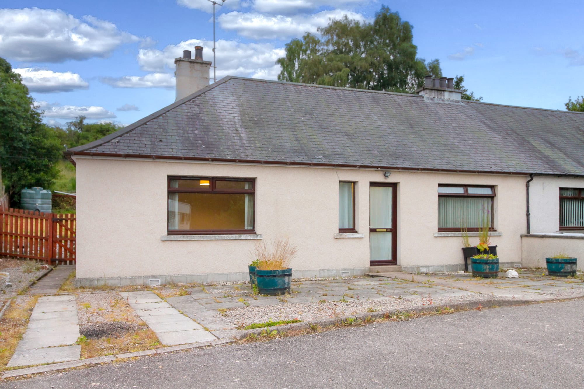 Front of the bungalow from the paved approach