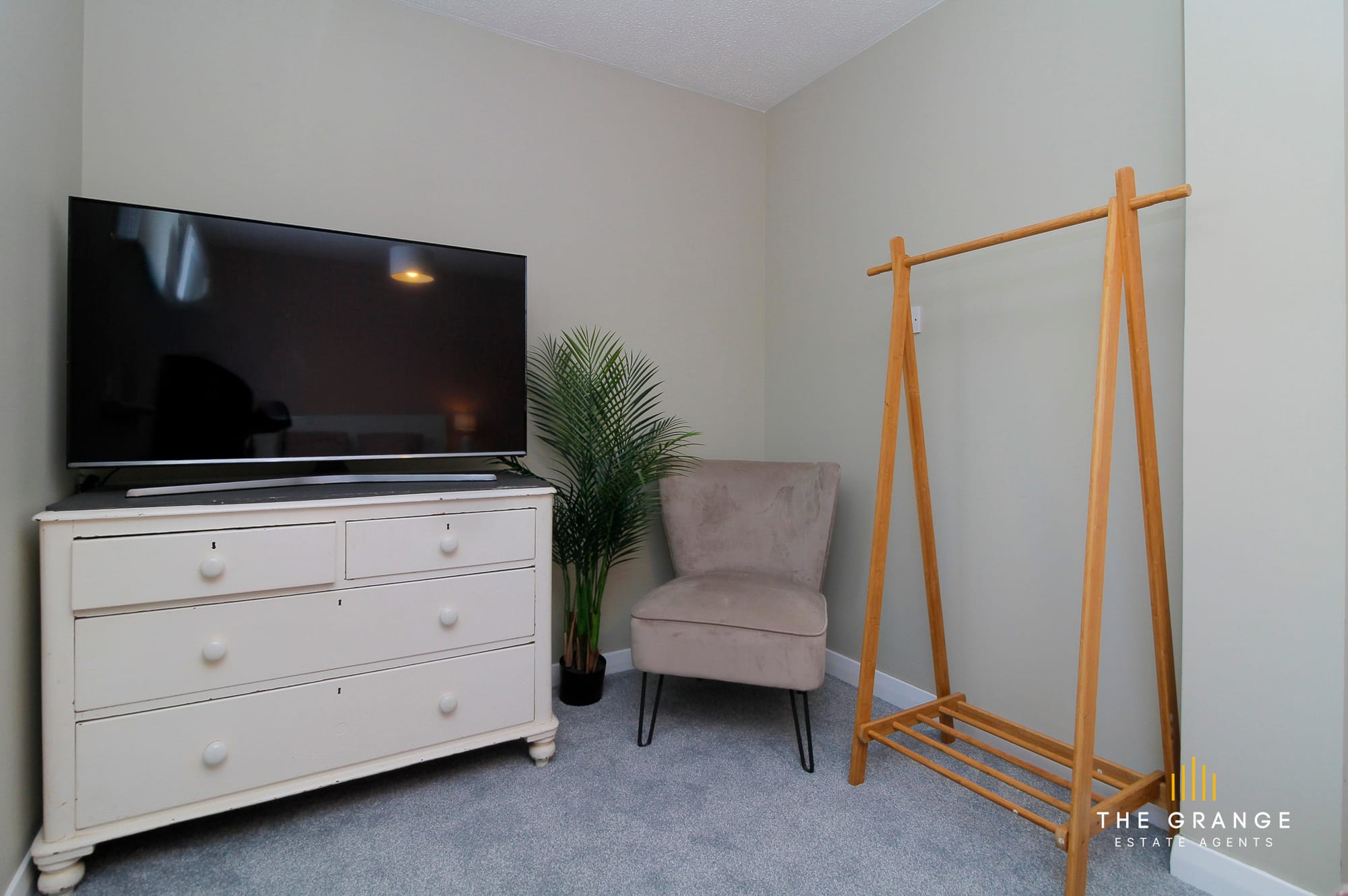 Bedroom 2, dresser and seating