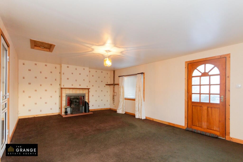 Reception room with tiled fireplace