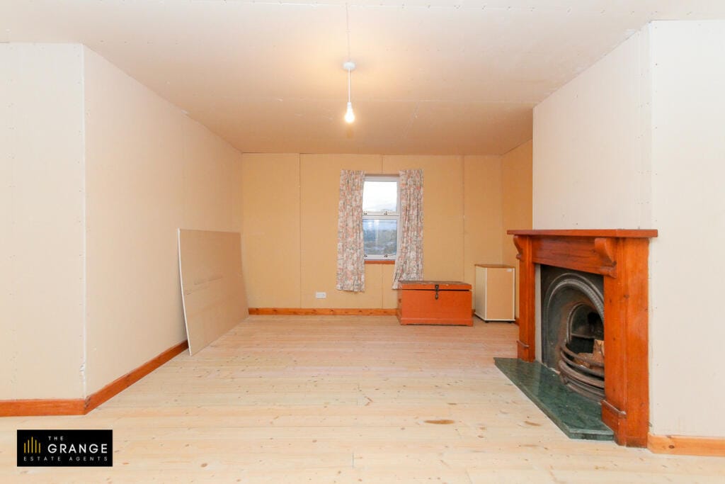 Second reception room with pine fireplace