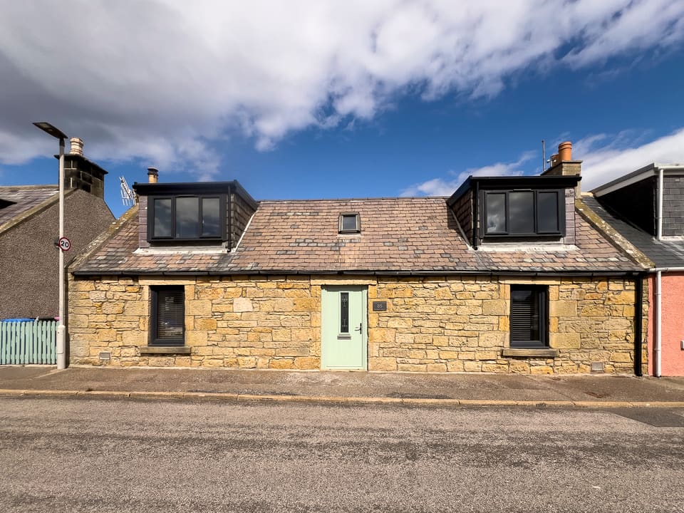 The stone frontage of the cottage on Dunbar Street, Burghead