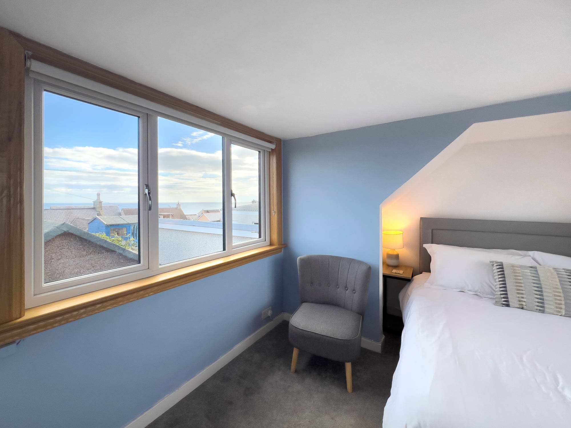 Bedroom window seat and armchair — Dunbar Street, Burghead