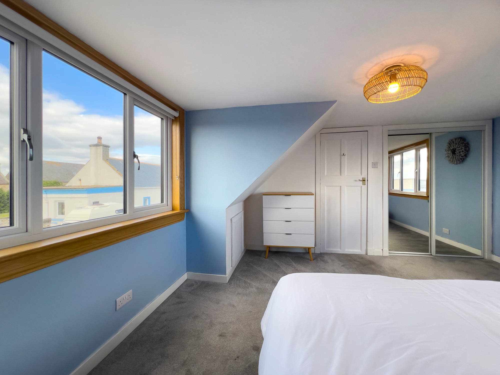 Bedroom with built-in drawers and dormer window — Dunbar Street, Burghead