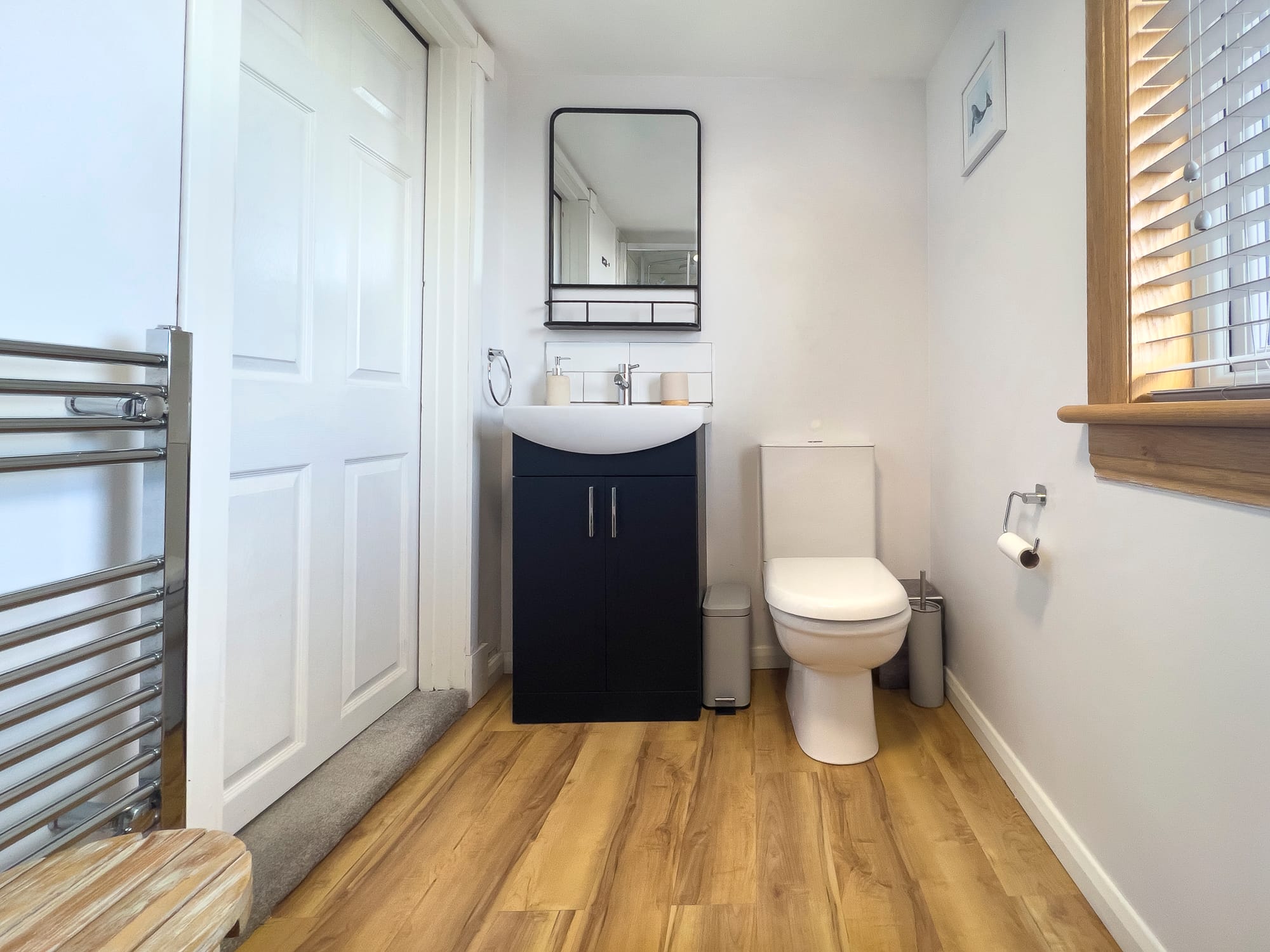 Shower room vanity basin and toilet — Dunbar Street, Burghead