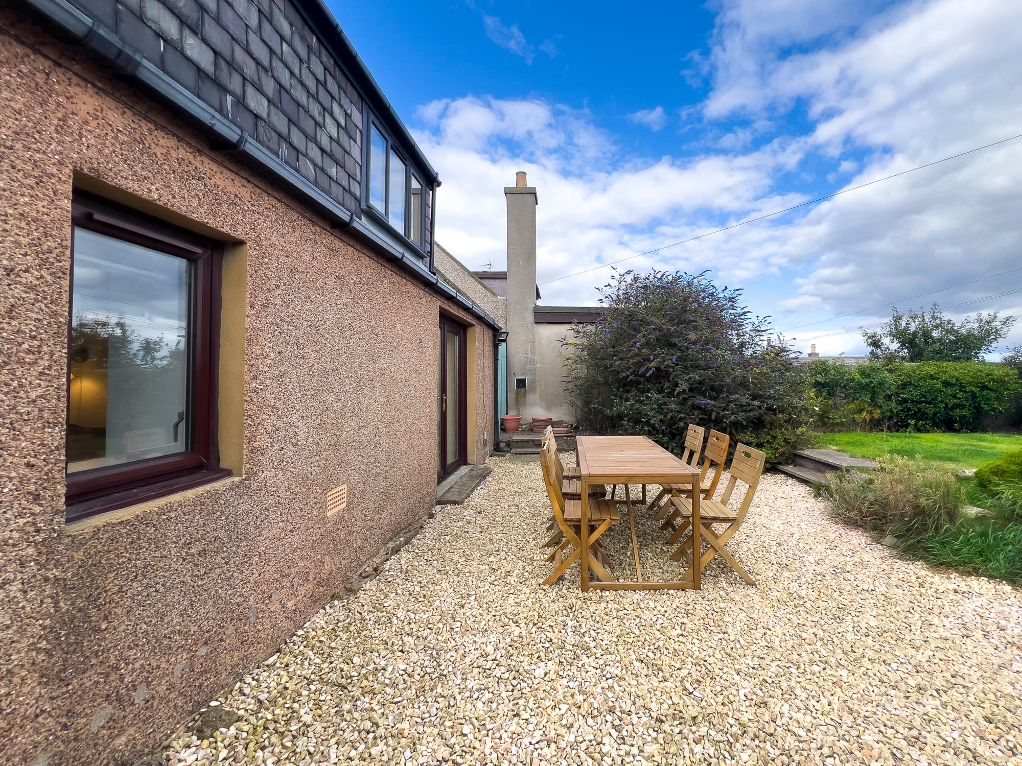 Patio and table beside the house — Dunbar Street, Burghead
