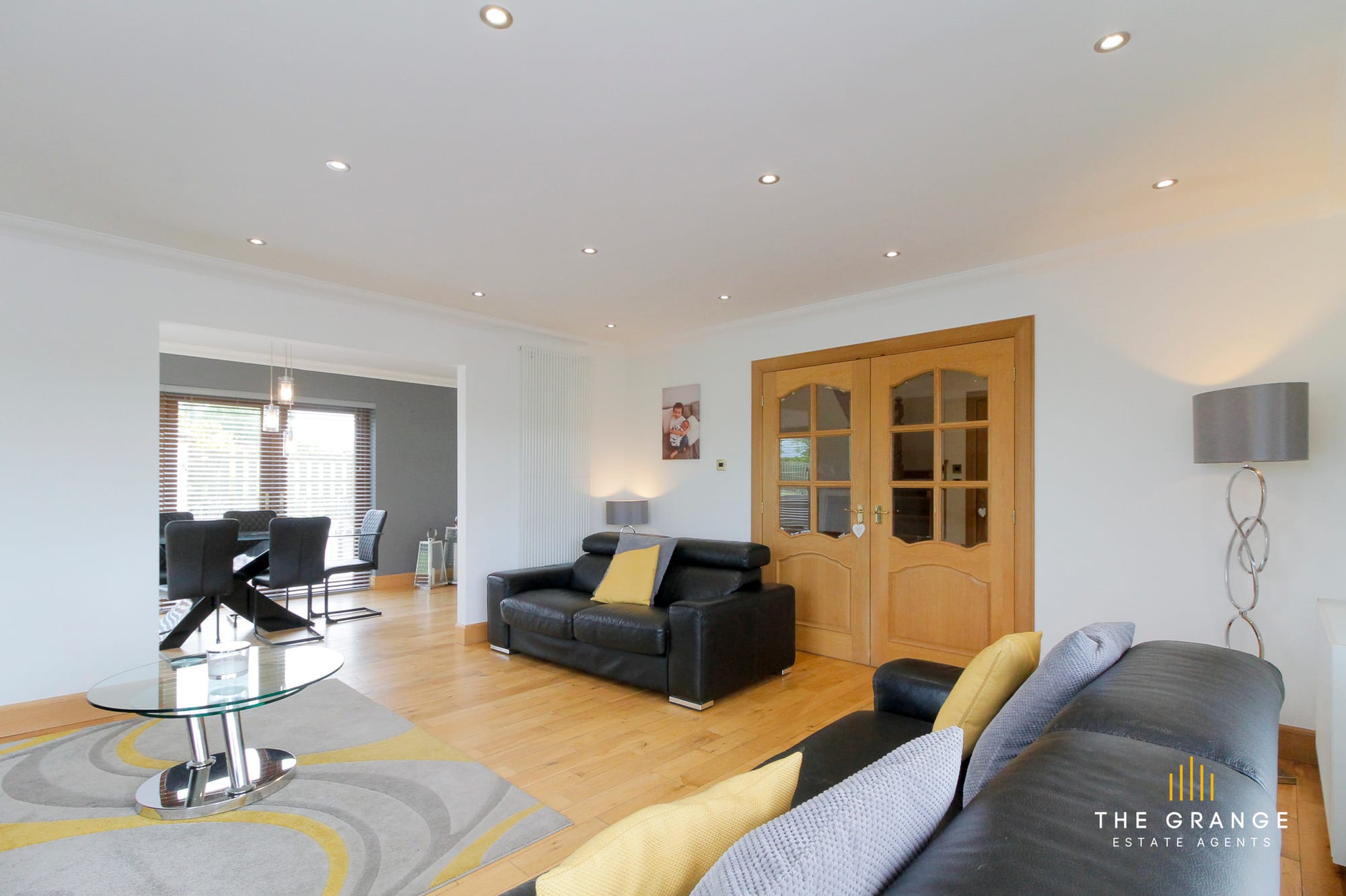 Sitting room with double doors to the hall