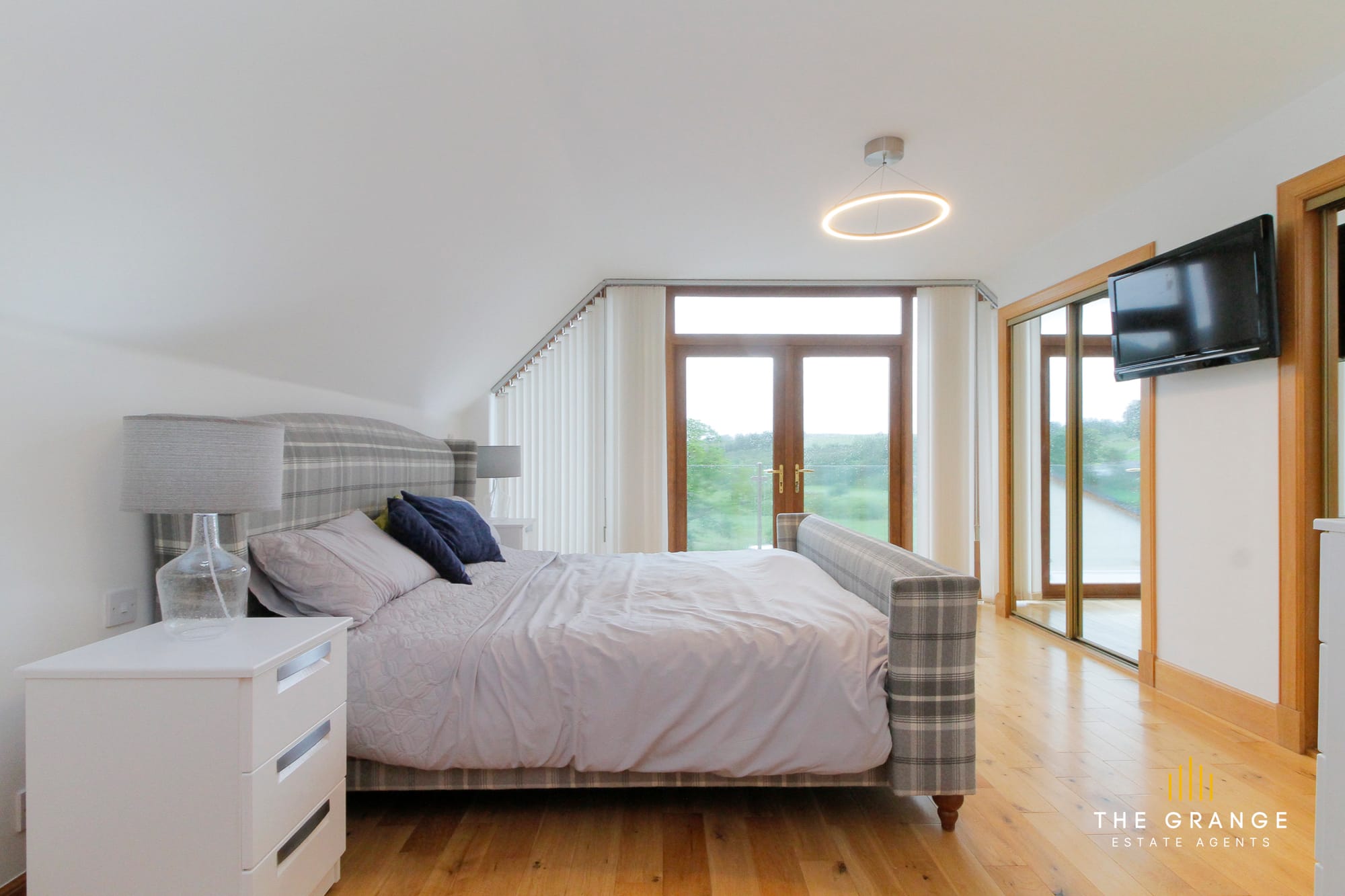 Principal bedroom with balcony