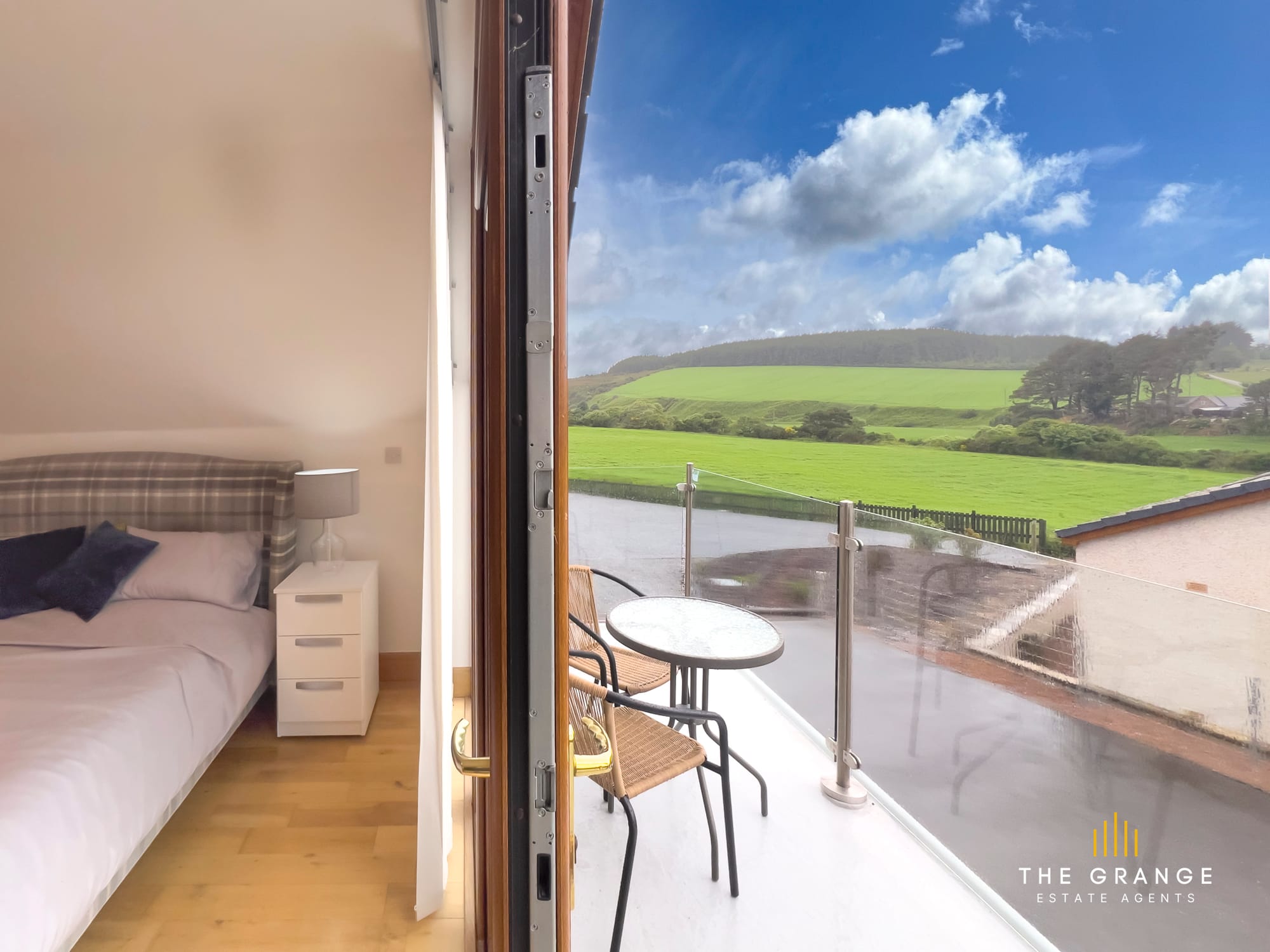 Balcony off the principal bedroom, with countryside views