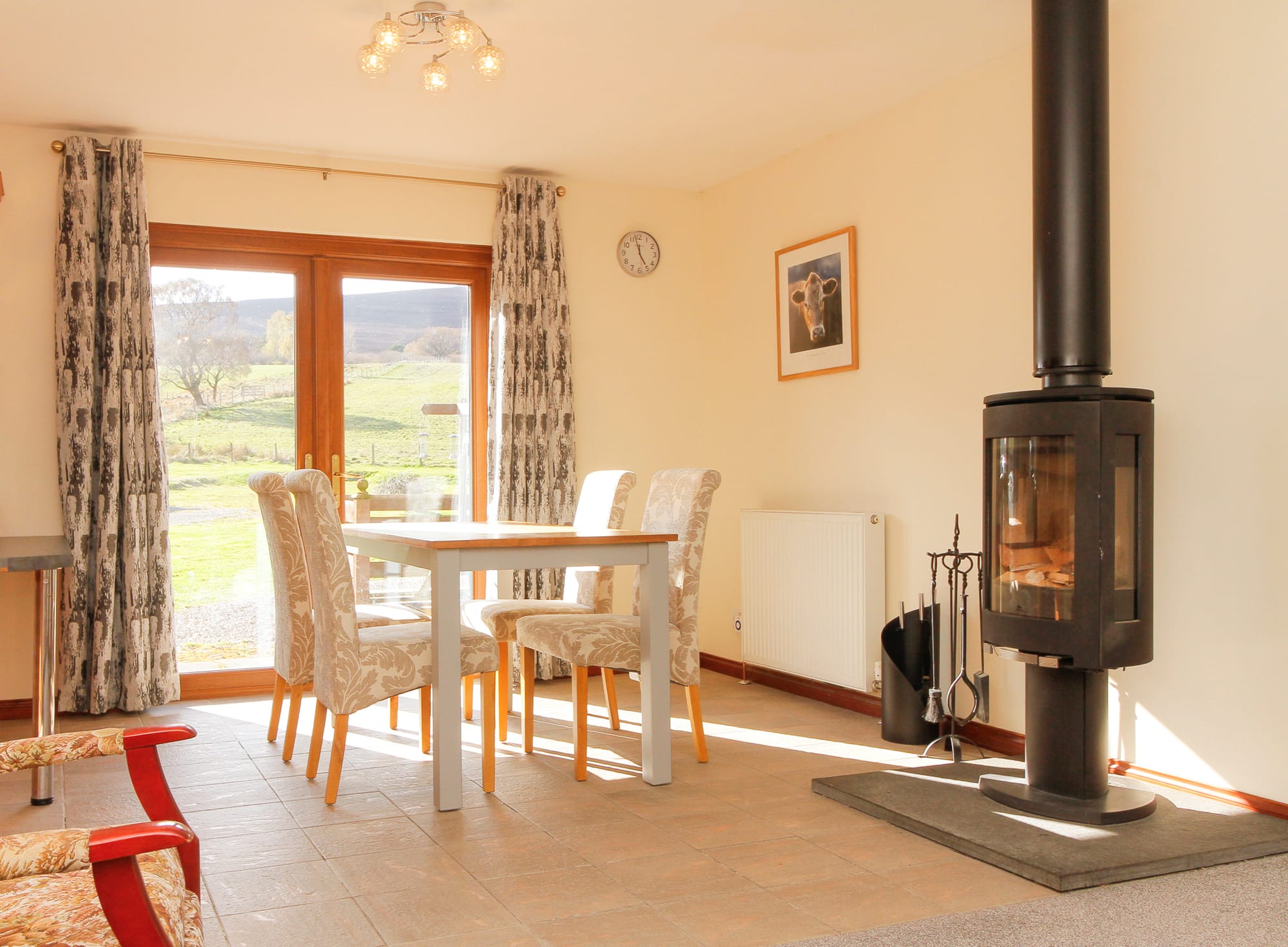 Dining area with wood-burning stove