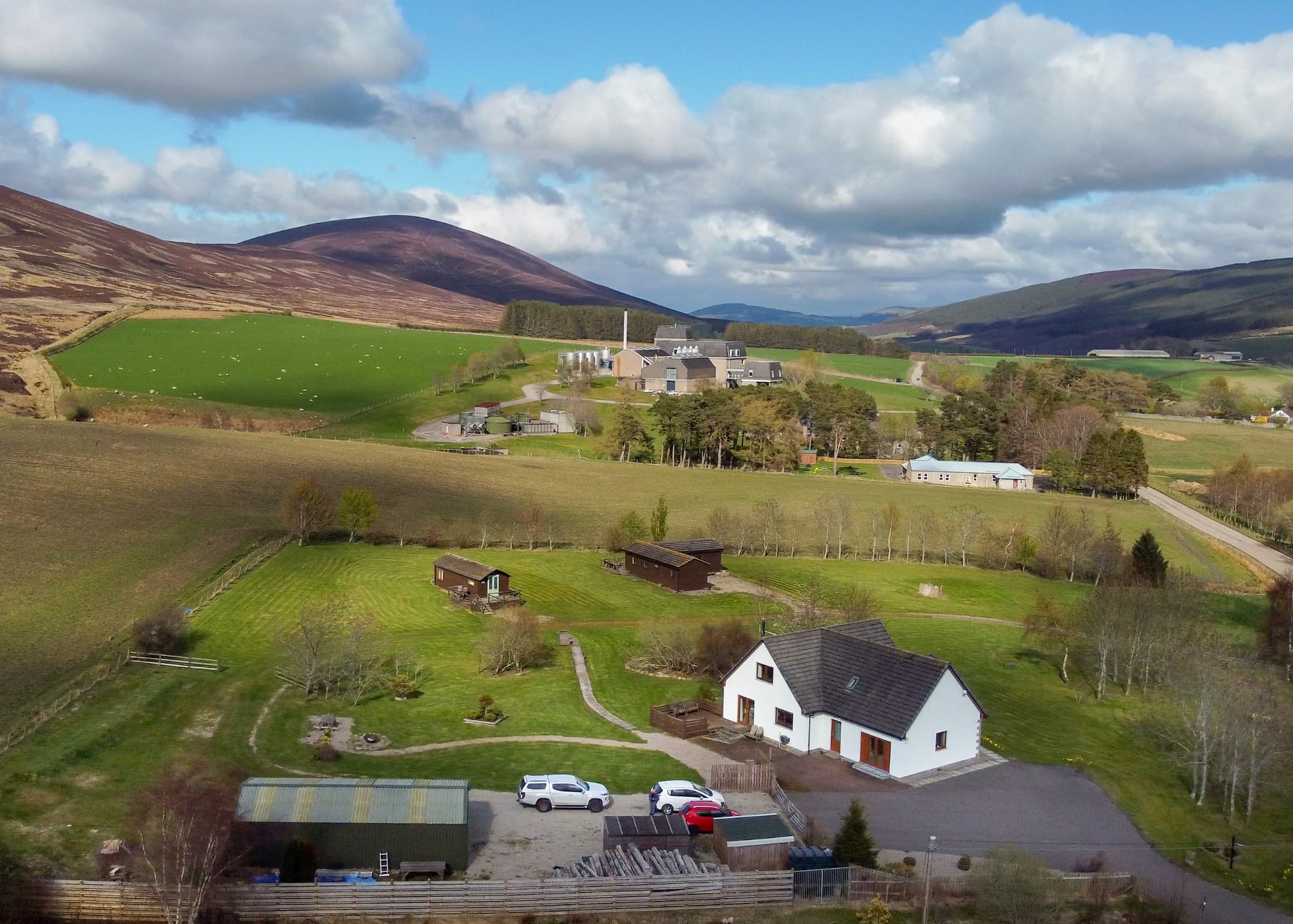 Aerial view of the property and grounds