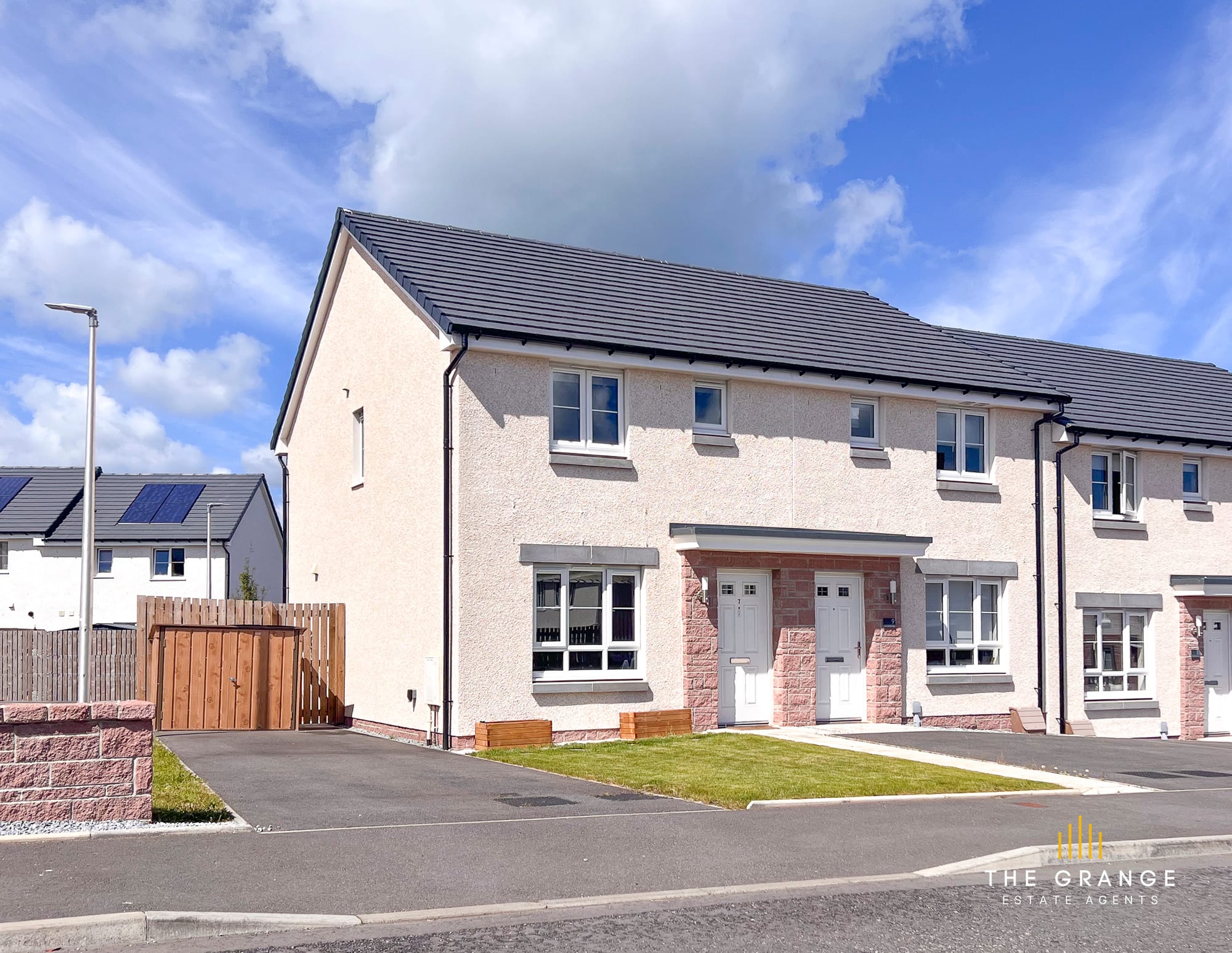 Front of the home with driveway and off-street parking