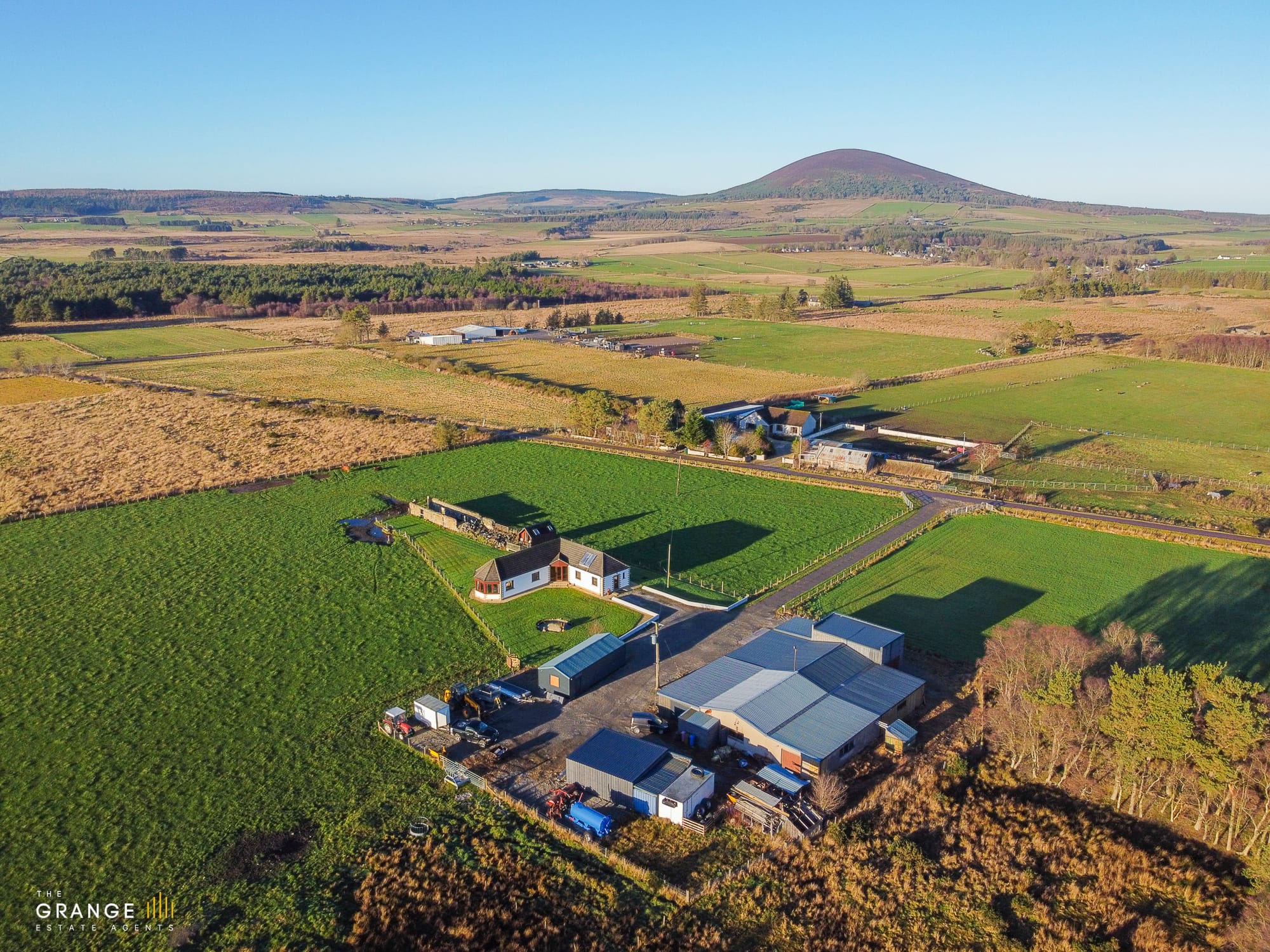 Aerial view of the property and grounds