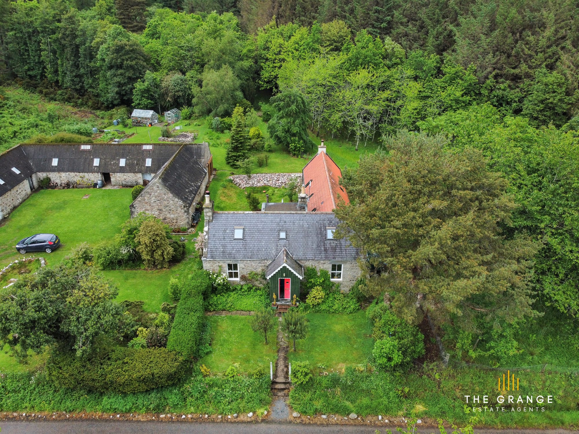 The cottage entrance and garden