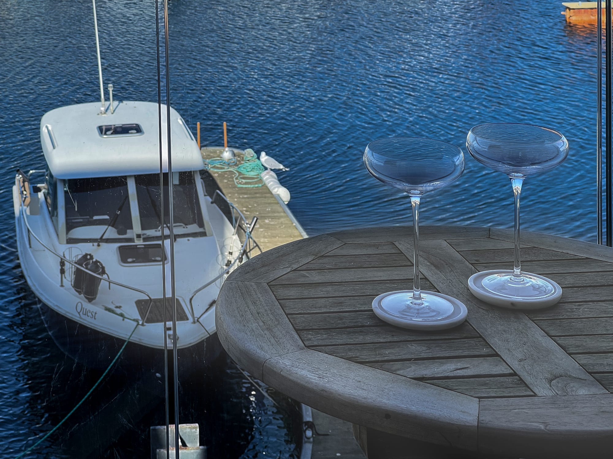 Balcony seating with marina views