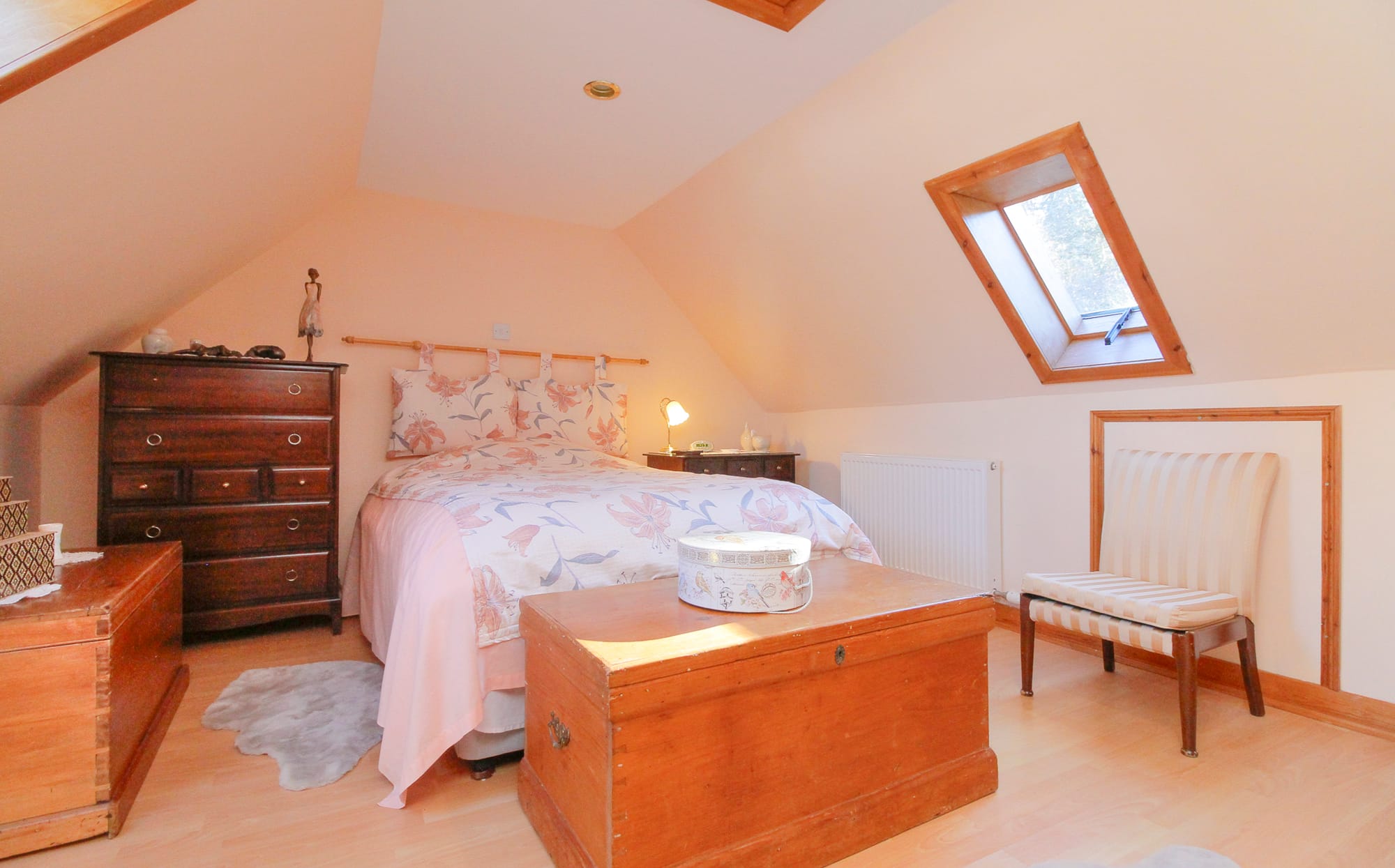 Principal bedroom with coombed ceiling