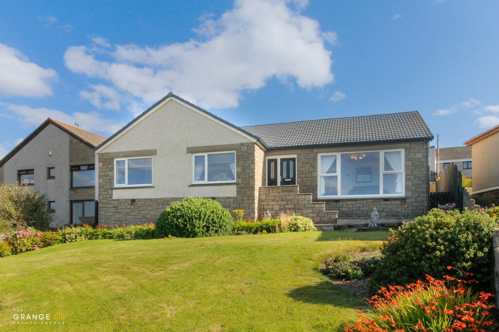 The bungalow and front garden