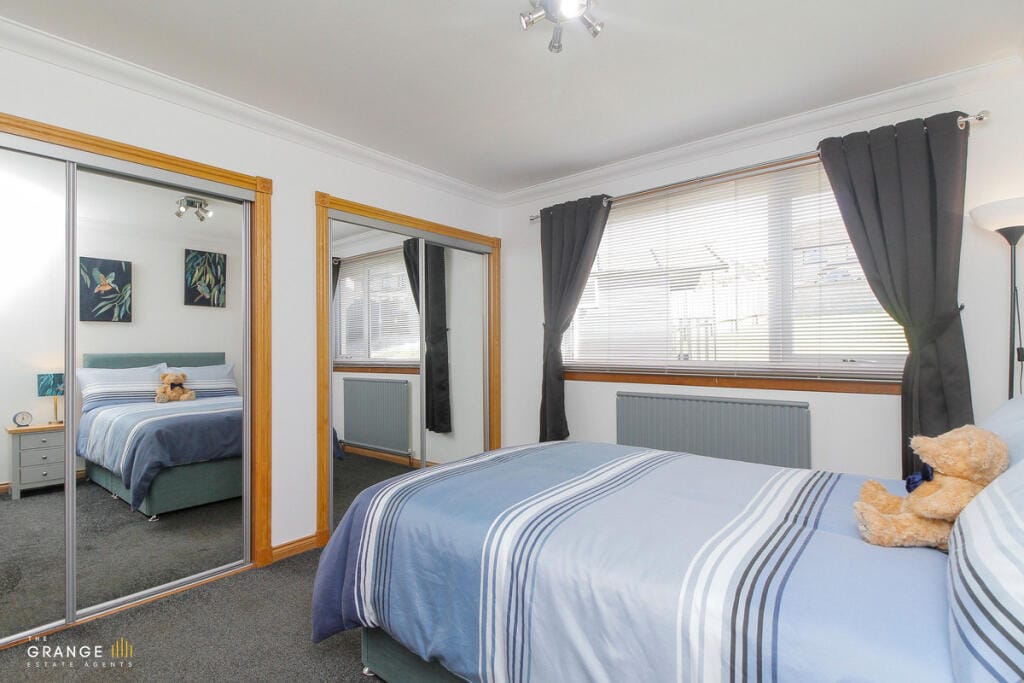 Bedroom with fitted wardrobes