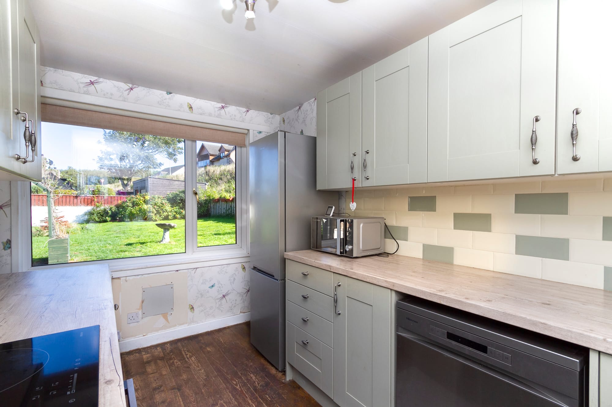 Kitchen with a window over the garden