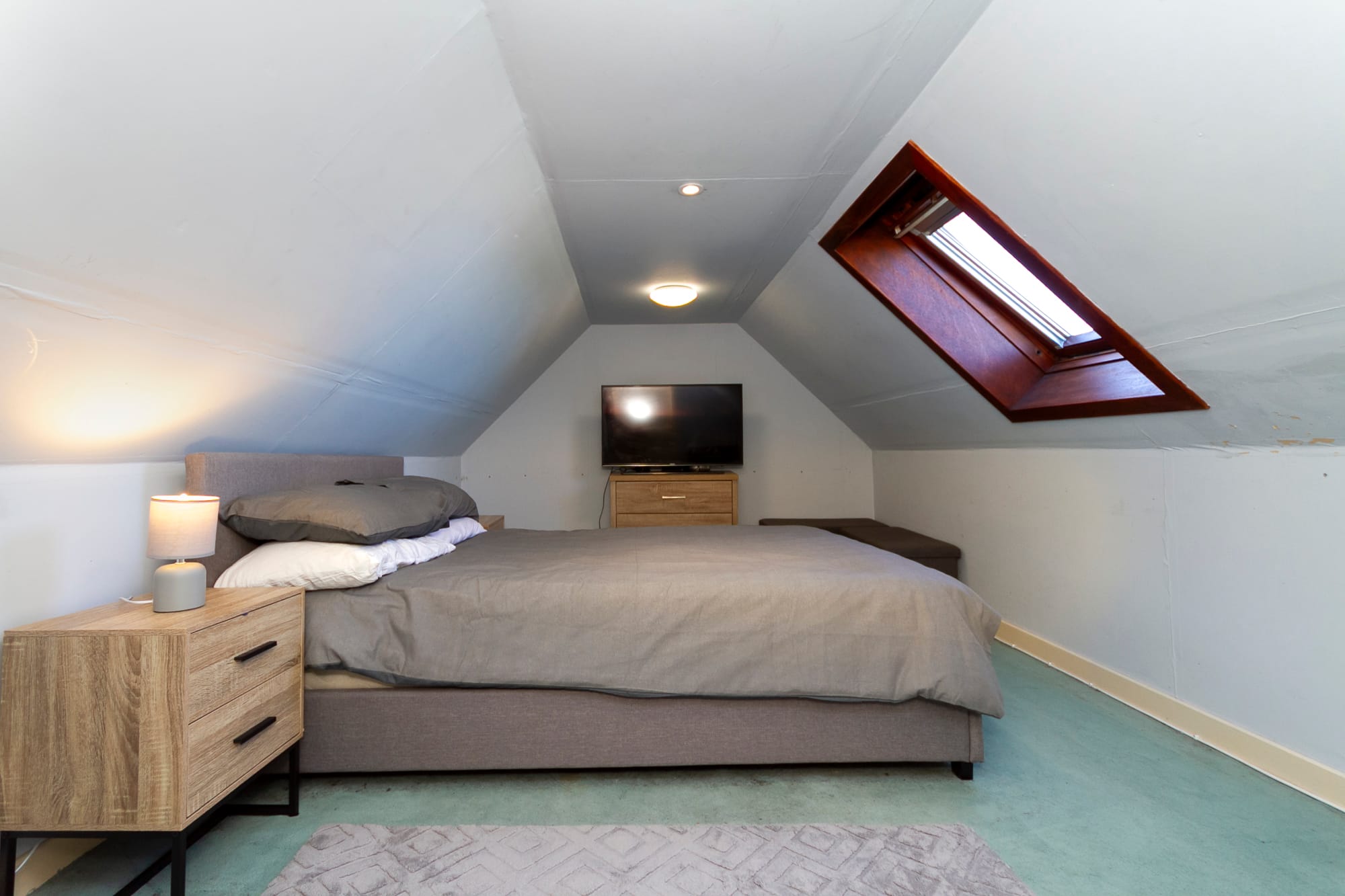 Attic bedroom with rooflight