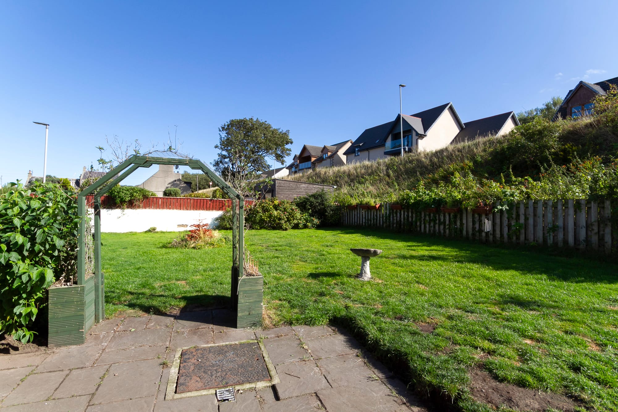 Garden with the arch and bird bath