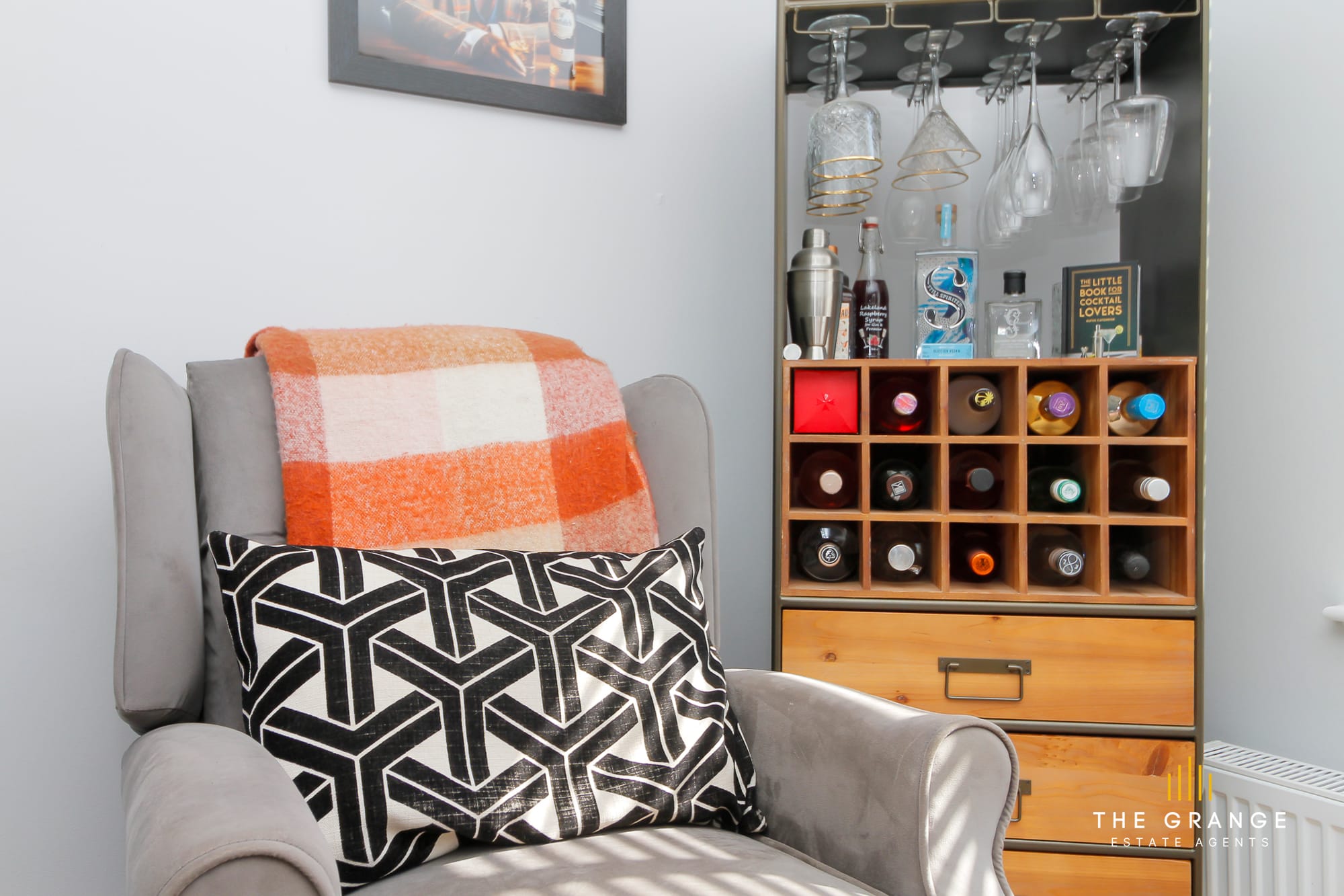 Armchair and drinks cabinet in the living room