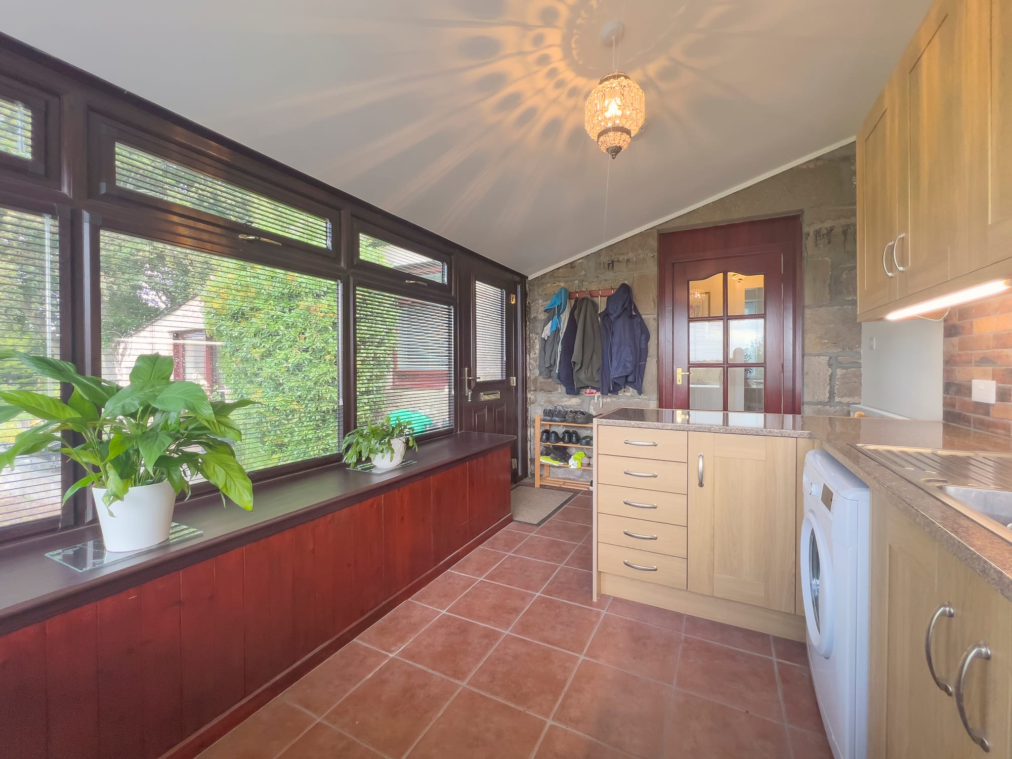 Utility room with garden outlook