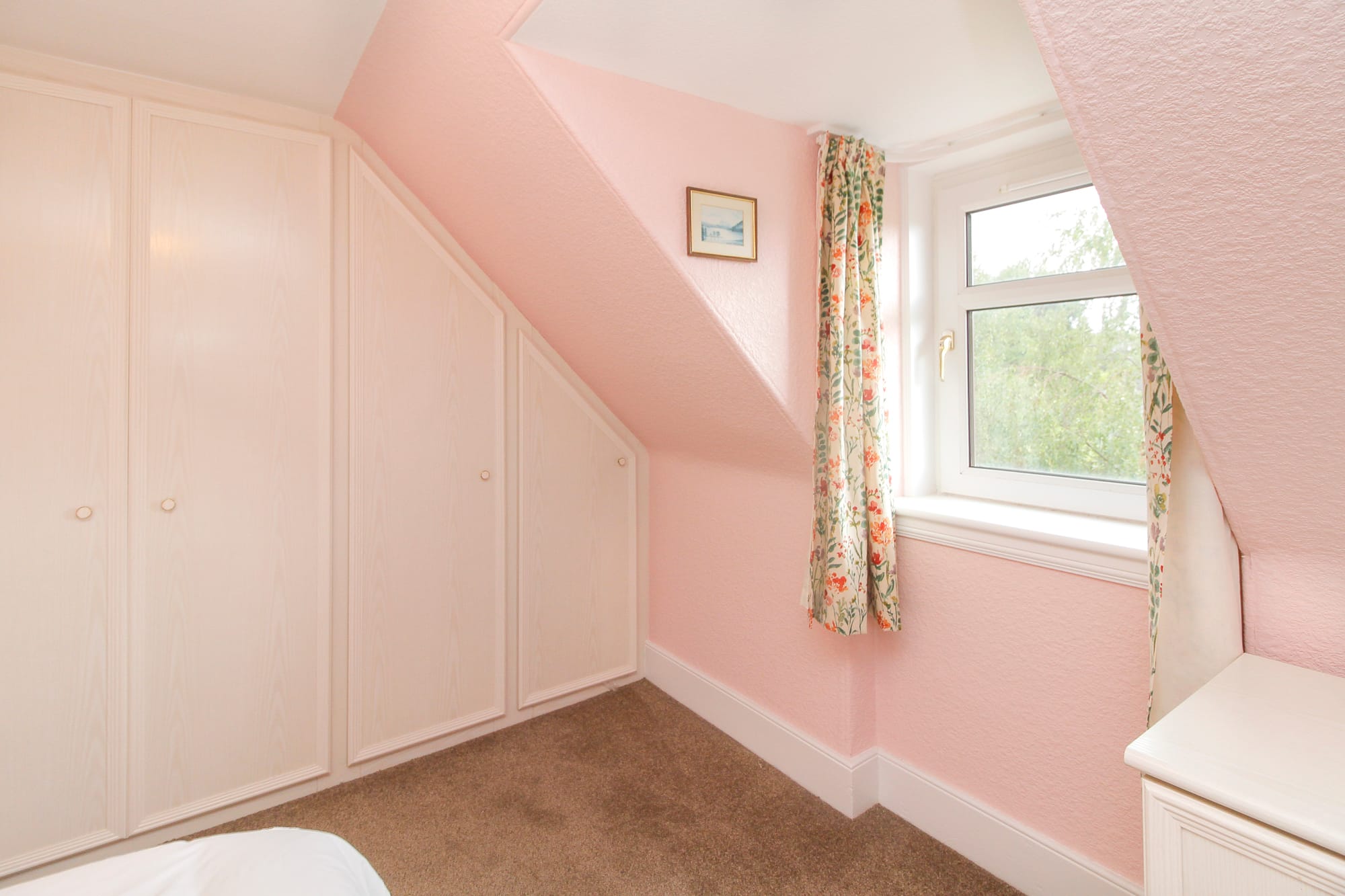 Second first-floor bedroom with fitted wardrobes
