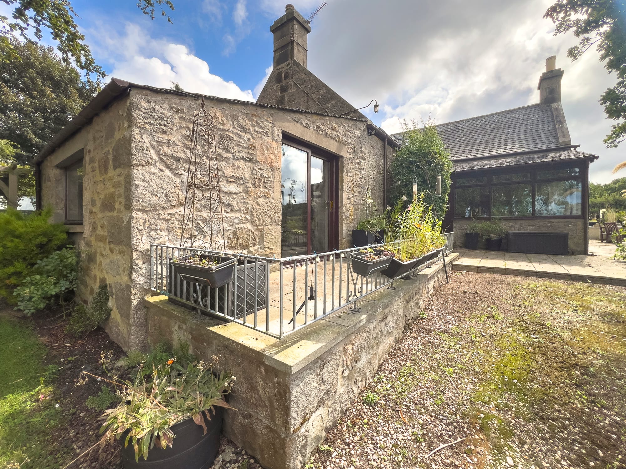 Stone outbuilding beside the terrace