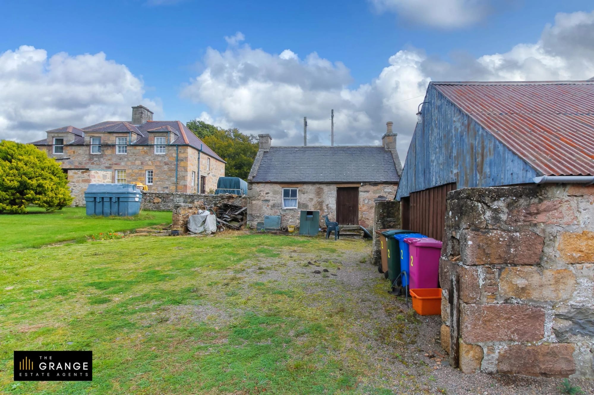 Stone outbuildings and yard